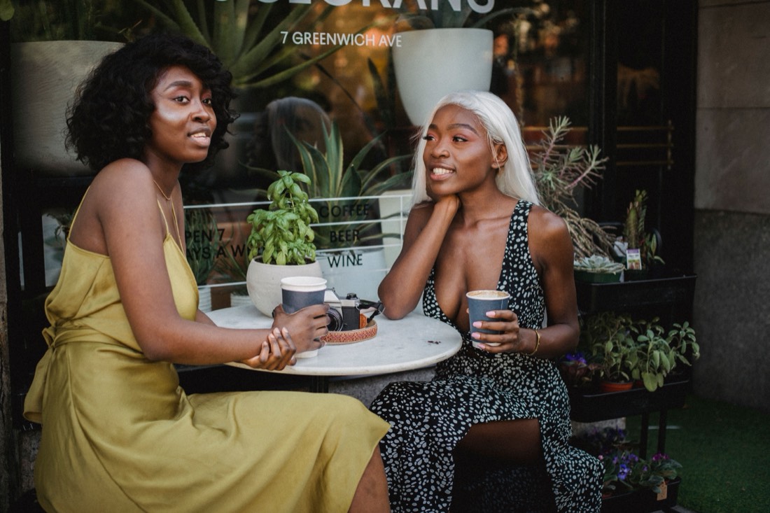 Friends catching up at a corner café